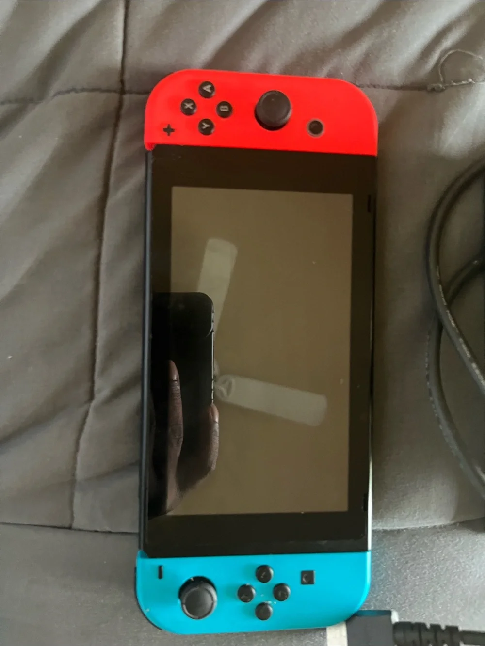 Nintendo Switch with Neon Blue & Neon Red Joy‑Con Controllers and Dock